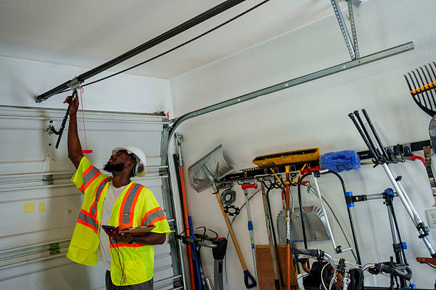 Professional Garage Door Panel Replacement technician working in McLendon-Chisholm, TX